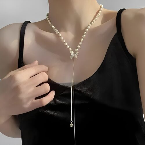 Elegant Pearl Necklace with Diamond Bow Pendant